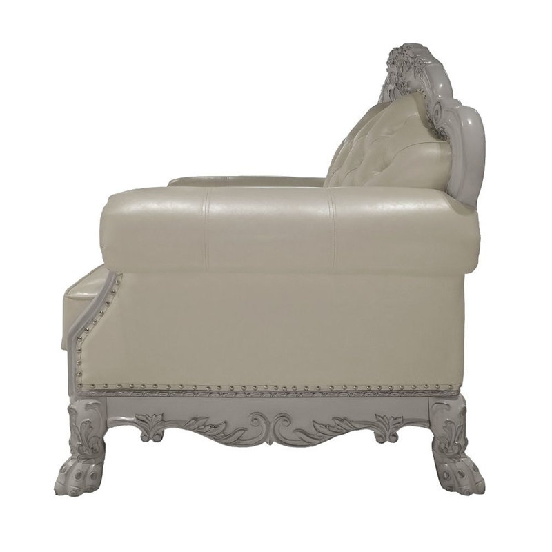 Fauteuil capitonné et demi Luyn