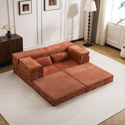 Matelas à compression orange, lit de sol convertible avec coussins ronds en polaire de haute qualité à assembler soi-même, idéal pour la décoration intérieure.