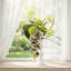 Fleurs artificielles avec vase