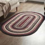 Tapis ovale rayé en jute / sisal / coton tressé à la main noir / rouge / brun clair