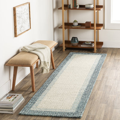 Tapis bleu en laine touffeté à la main Renne