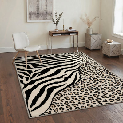 Abrahamson Zebra and Leopard Patchwork Animal Print Machine Washable Black / Beige Indoor Area Rug with Non-Slip Backing