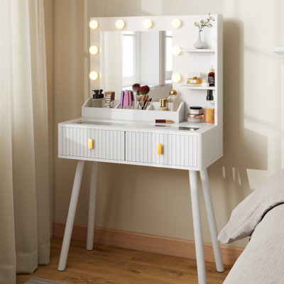 Table de coiffeuse cannelée blanche avec miroir et lumières de l'ampoule