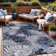 Chartier Machine Woven Floral Area Rug