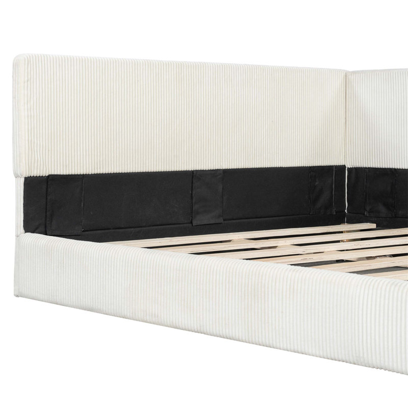 Lit de jour rembourré avec un design en forme de L, des sièges spacieux, une structure solide et polyvalente et une chambre à coucher moderne.