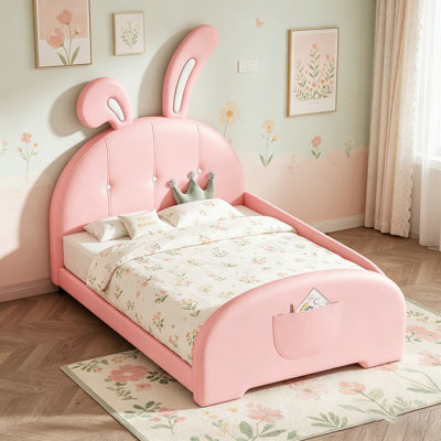 Lit simple princesse en forme de lapin rembourré avec tête et pied de lit, parfait pour les chambres d'enfants et les jeux imaginatifs
