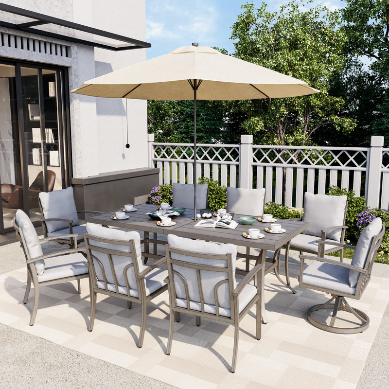 Mongeon Patio Dining Set with Rectangular Table , Cushions Included, 8