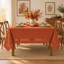 Nappe 60 "x 84" en faux lin orange brûlé avec bordure découpée