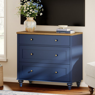 Corretta Solid and Manufactured Wood TV Stand for Living Room, TV Cabinet With 3 Drawers for TVs up to 43"