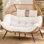 Fauteuil en osier pour 2 personnes avec coussins