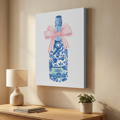 Art mural sur toile en forme de bouteille de champagne ornée d'un nœud rose - motif floral bleu - 1 po de profondeur - 24 po x 36 po
