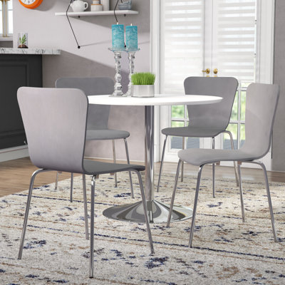 Theotis Pedestal Dining Set