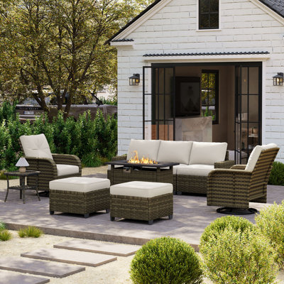Ensemble de patio 9 pièces en résine tressée PE tressée à la main avec chaises pivotantes et table foyer