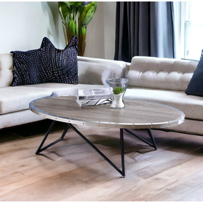 Table basse en chêne gris patiné, base en métal, capacité de poids de 70 lb, profondeur noire de 23 po et plateau ovale