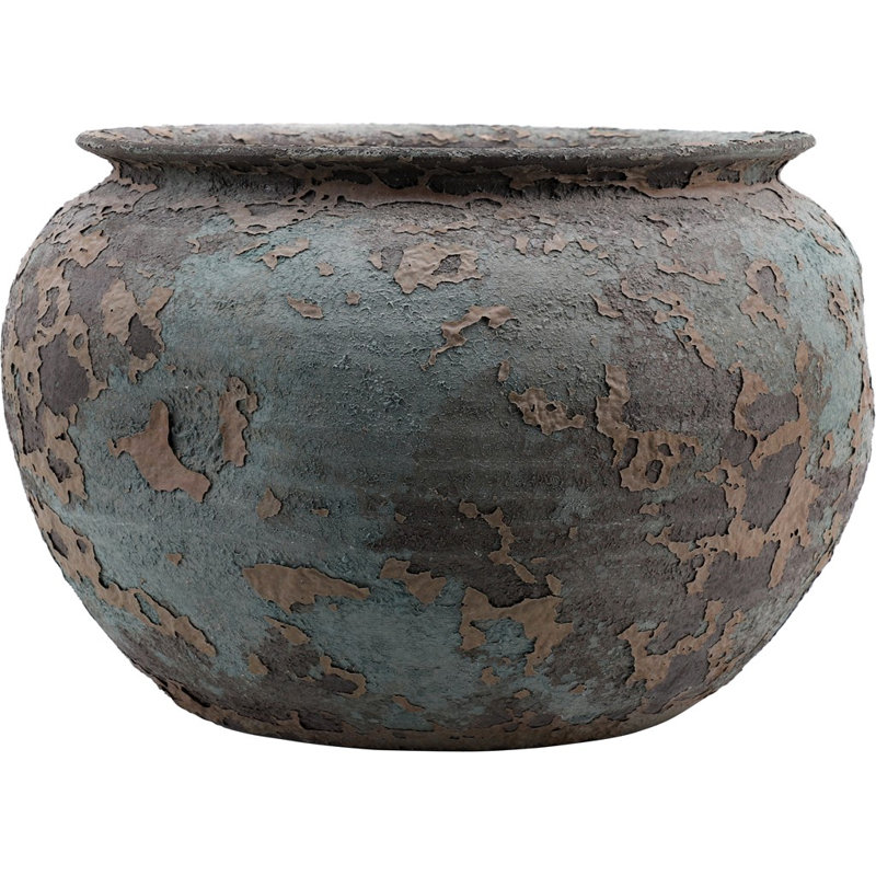 Poterie ronde en porcelaine émaillée