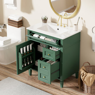 Meuble-lavabo de 76 cm avec lavabo intégré, style minimaliste moderne, 3 tiroirs, pieds romains élégants, et organisateur de porte pour 2 tiroirs basculants, tablette réglable, fini métal lisse.