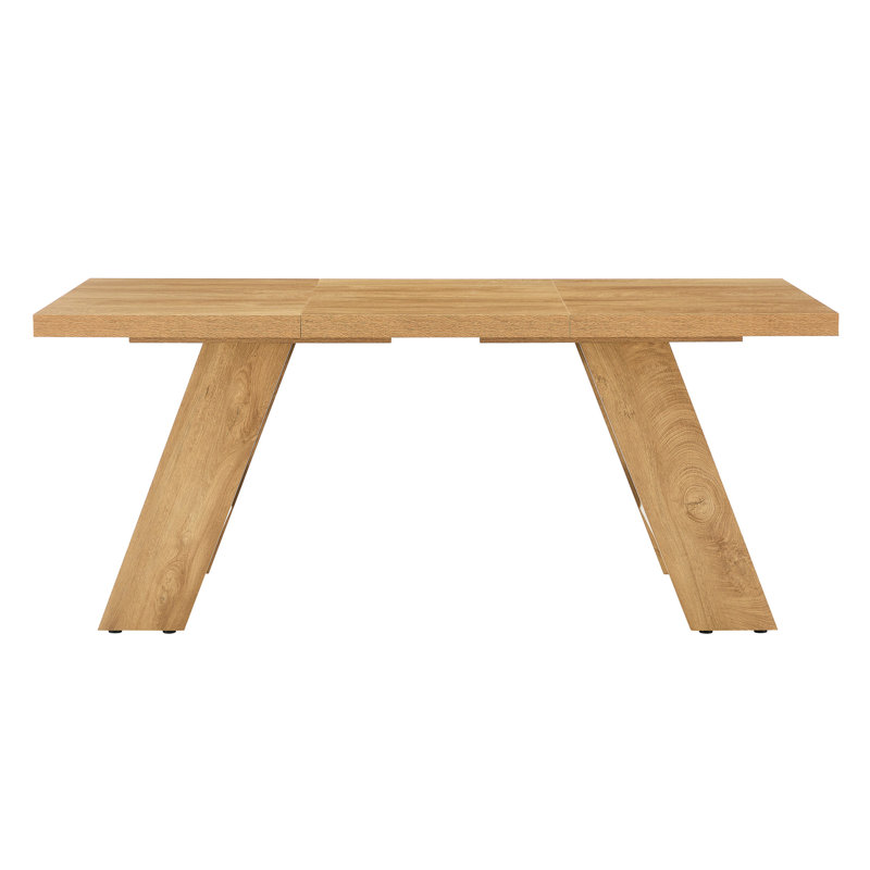 Table de salle à manger rectangulaire en bois aggloméré de 71 po x 31,5 po d'épaisseur avec pieds en bois à double panneau incliné vers l'extérieur. Table de salle à manger moderne pour un usage domestique. Accueille 6 à 8 personnes, polyvalent pour de multiples cas de figure.