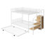 Lit superposé simple au-dessus d'un lit double en métal avec lit gigogne, échelle de rangement latérale et garde-robe-994969612