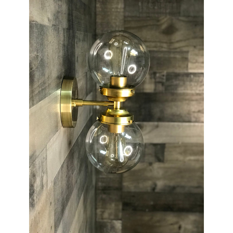 Rada Armed Sconce, Raw Brass, Clear