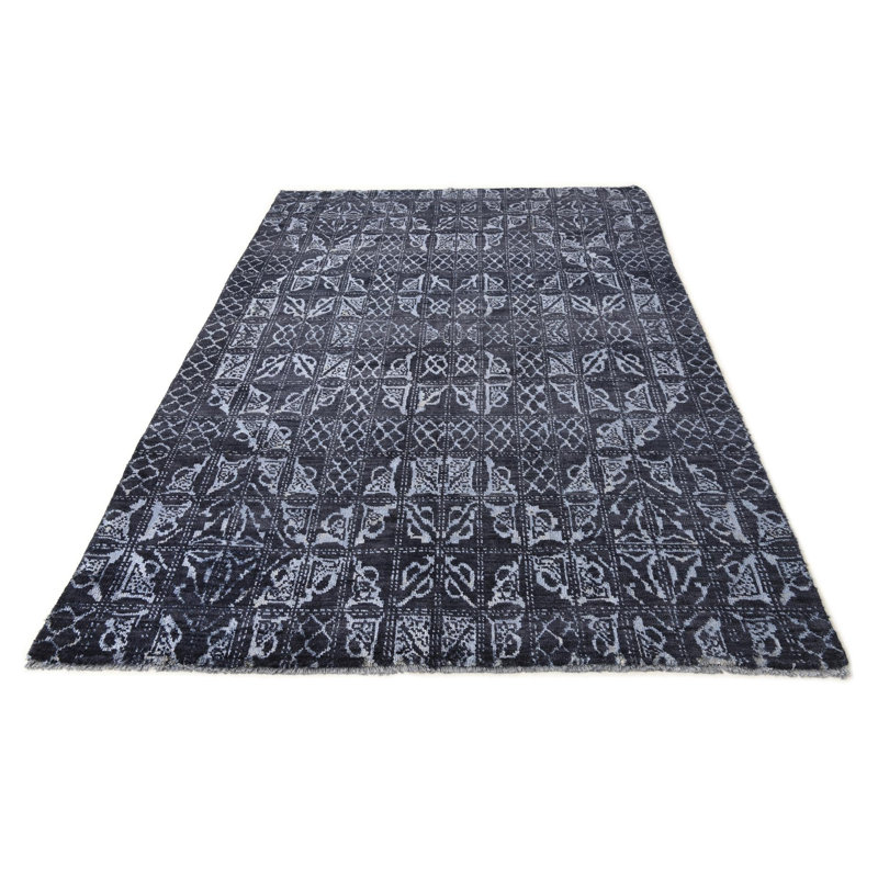 Iniguez Black Rug