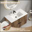Meuble-lavabo mural de 36 pouces avec panneau cannelé 3D et lavabo intégré en céramique, parfait pour les salles de bain modernes et élégantes.-129166323