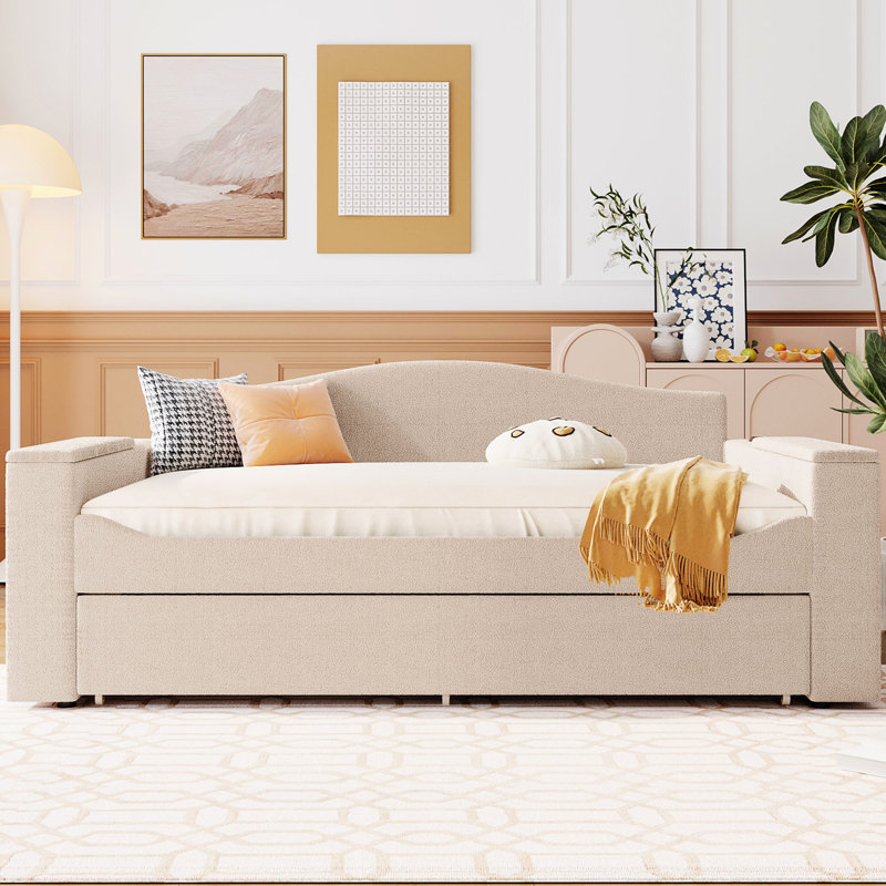 Lit de jour en molleton beige avec compartiment de rangement, lit gigogne et système de son