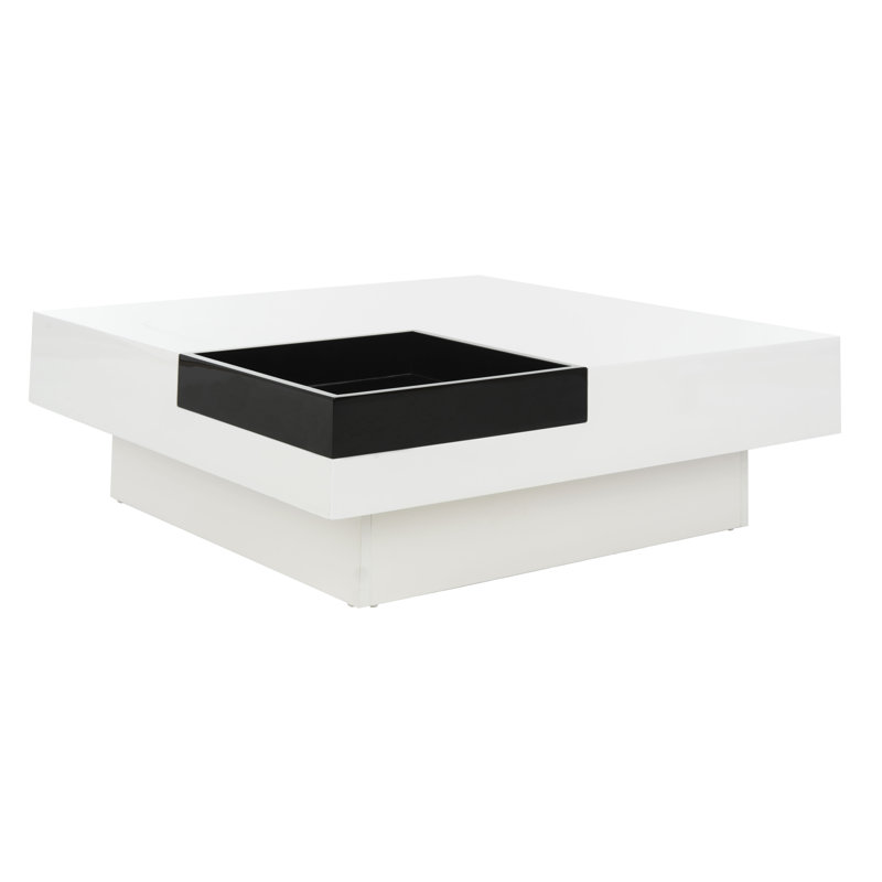 Table basse élégante Rubbina - surface laquée blanche élégante avec base de socle pour les salons modernes