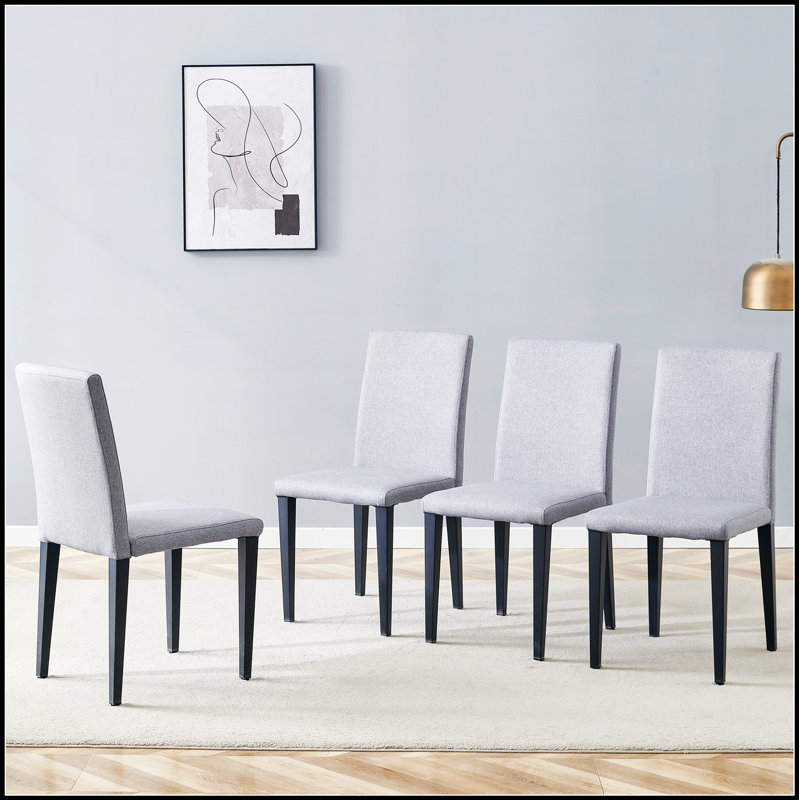 Quatre chaises de salle à manger en coton et lin gris clair, simples et polyvalentes, confortables et accompagnées, ensemble de 4