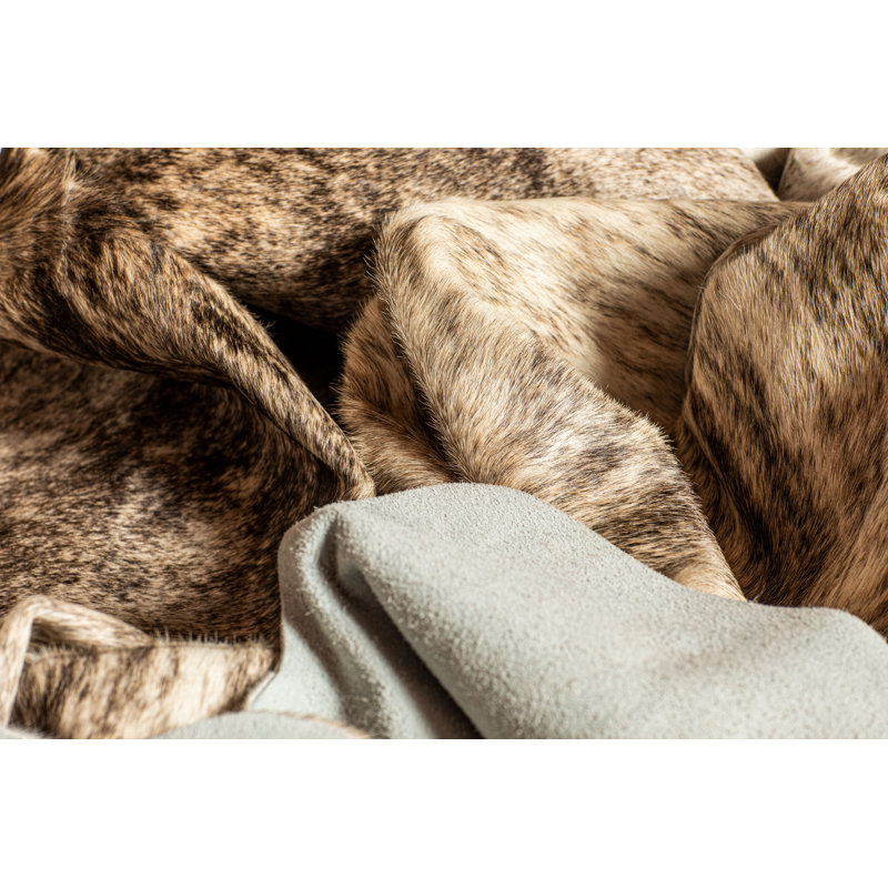 Tapis zèbre en peau de vache Abhinav