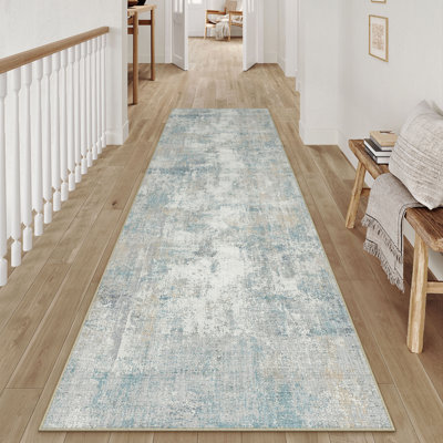 Tapis moderne lavable abstrait bleu