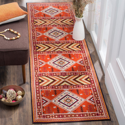 Tapis orange / or Aderito