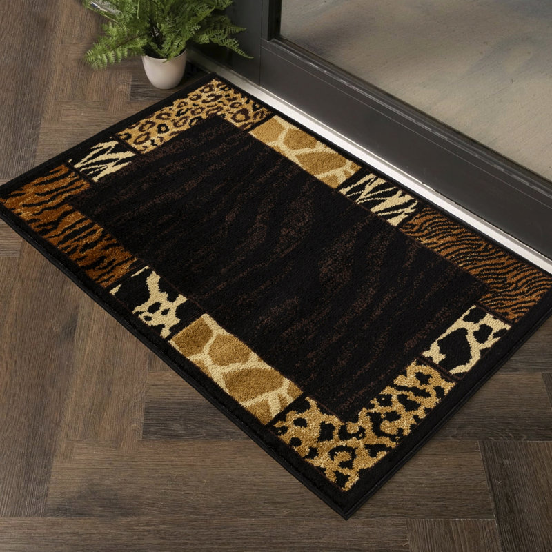 2 pi Tapis noir à motif animalier X 3