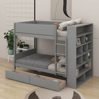 Lit superposé simple au-dessus de simple avec tiroirs et armoire