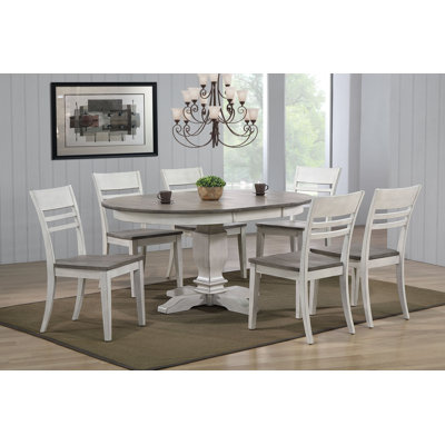 Henriquez 7 - Piece Extendable Rubberwood Solid Wood Dining Set