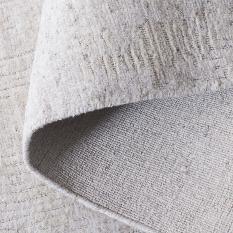 Tahlib Hand Loomed Wool/Viscose/Cotton Solid Color Rug in Beige, Rectangle 6' x 9'