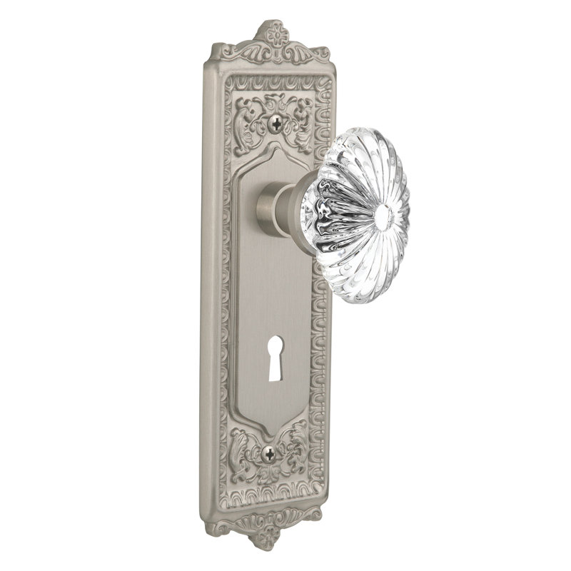Egg & Dart Plate avec trou de serrure décoratif et bouton de porte ovale en cristal cannelé, Nickel satiné, 2 3/4 po