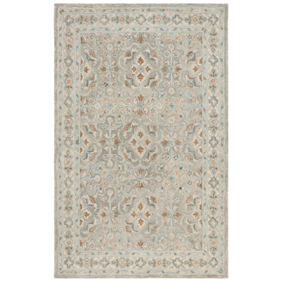 Mckinnleigh Hand Tufted Wool Cotton Oriental Rug in Green/Ivory