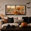 Citrouille orange et fleurs séchées sur toile d'Halloween rustique-24423161