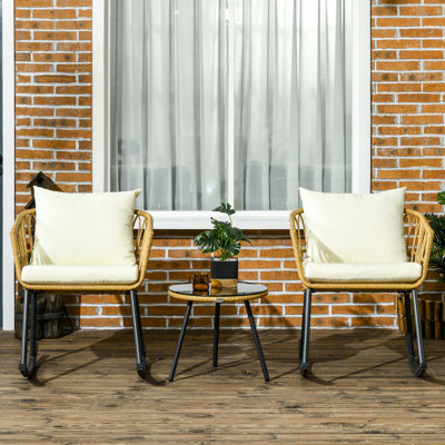 Chaise berçante d'extérieur pour patio - 3 pièces en blanc crème avec coussins et coussins de table. Table en verre trempé Chairs. Mobilier de porche confortable pour la détente