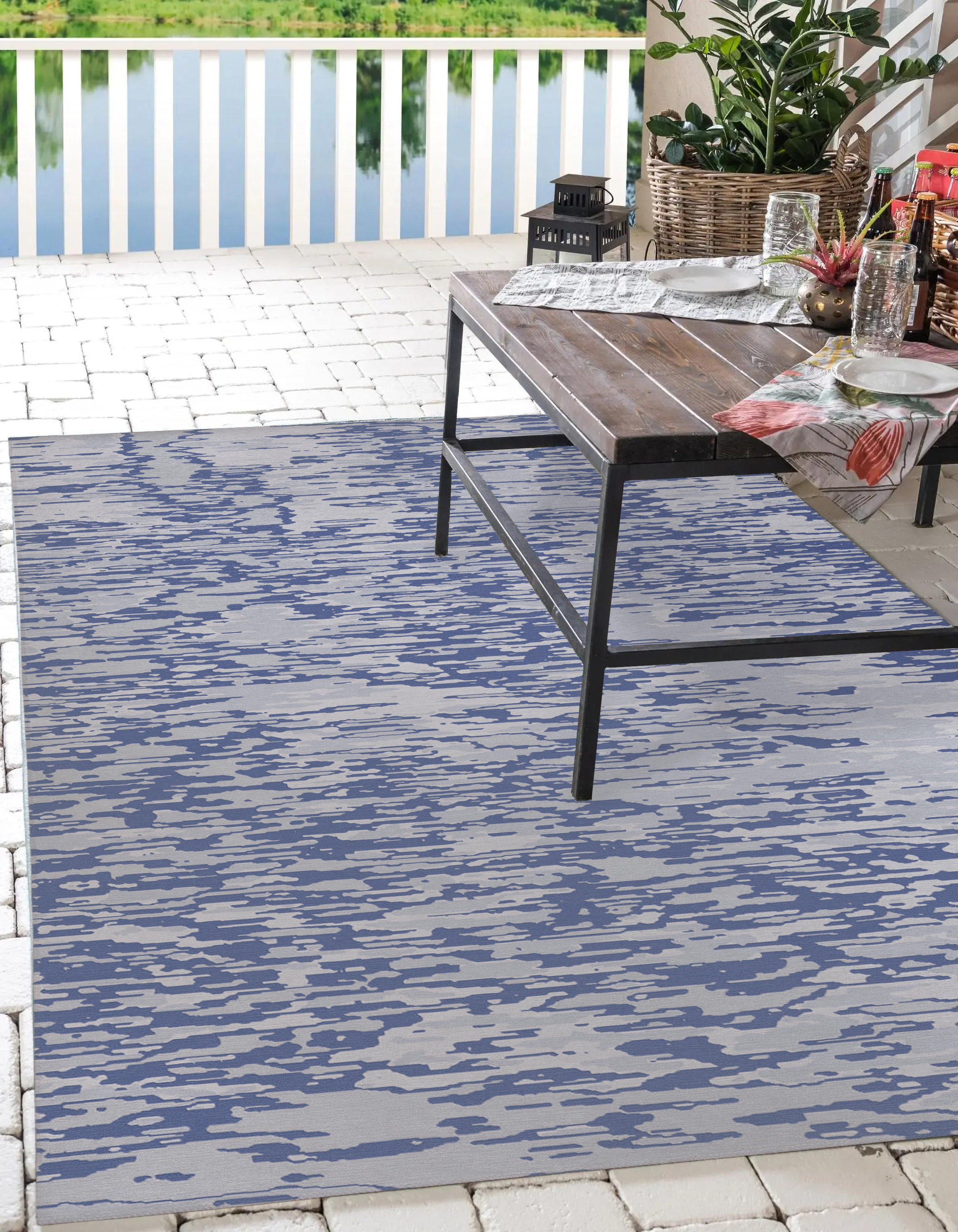 https://assets.wfcdn.com/im/16723656/compr-r85/2413/241367937/davanta-bluewhite-indooroutdoor-rug.jpg