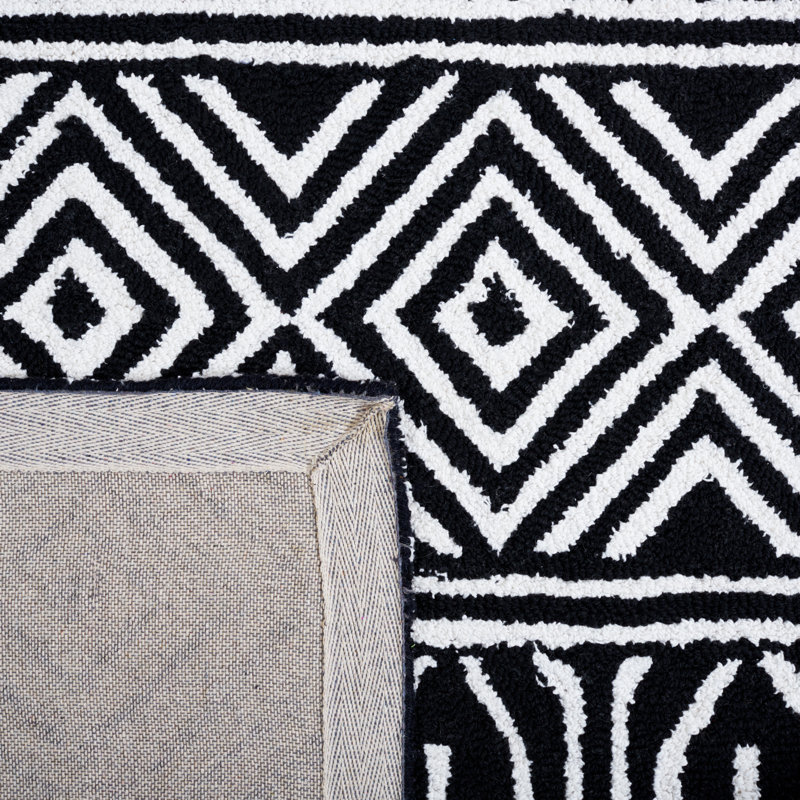 Tapis ivoire / noir Capri 702, Rectangle de 5 pi x 8 pi