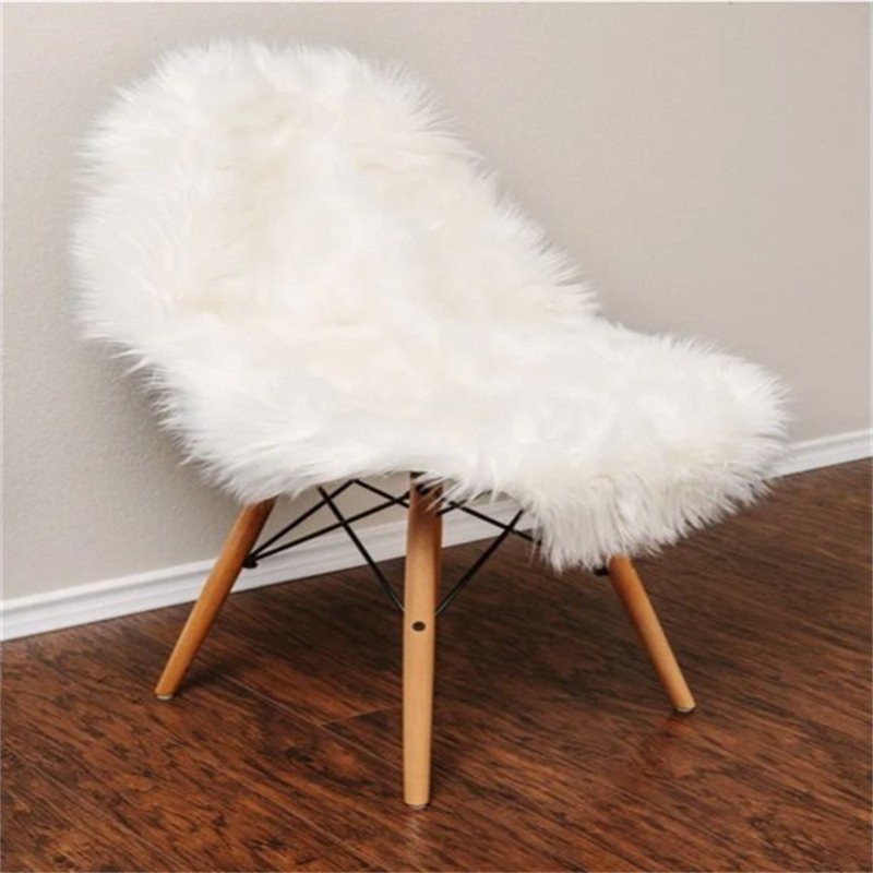 Haja Fluffy Faux Sheepskin Fur Shag Area Rug in White, Oval 2' x 3'