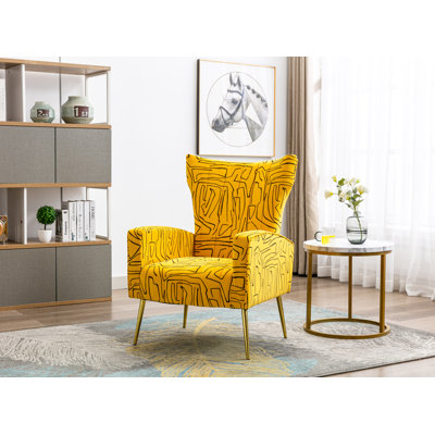 Fauteuil à oreilles en velours Citium