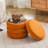 Leiani 19.5" W Round Upholstered Storage Ottoman -676380858