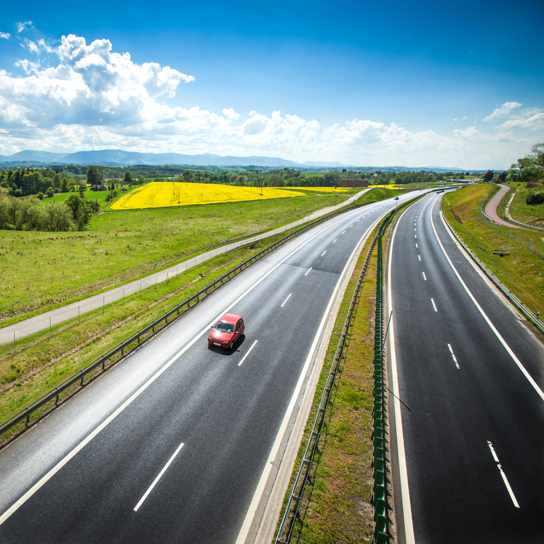 Leinwandbild Zweizeilig, Breite Straße mit Kurve, Highway