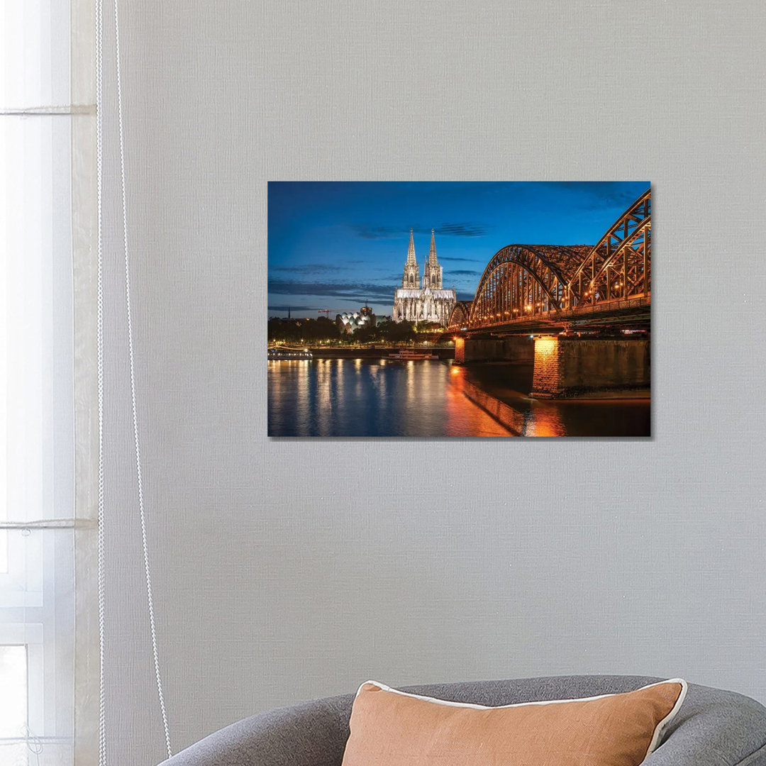 Cologne Skyline At Night With Cologne Cathedral And Hohenzollern Bridge by Jan Becke - Wrapped Canvas Print