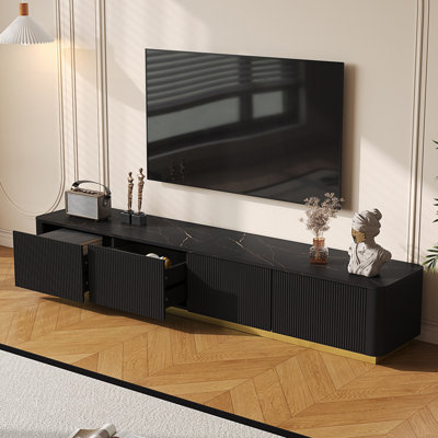Meuble télé de luxe à cannelures, console multimédia en faux marbre avec 4 tiroirs