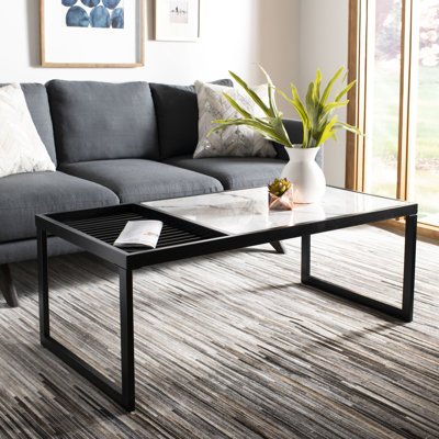 Zuri Sled Coffee Table by Orren Ellis