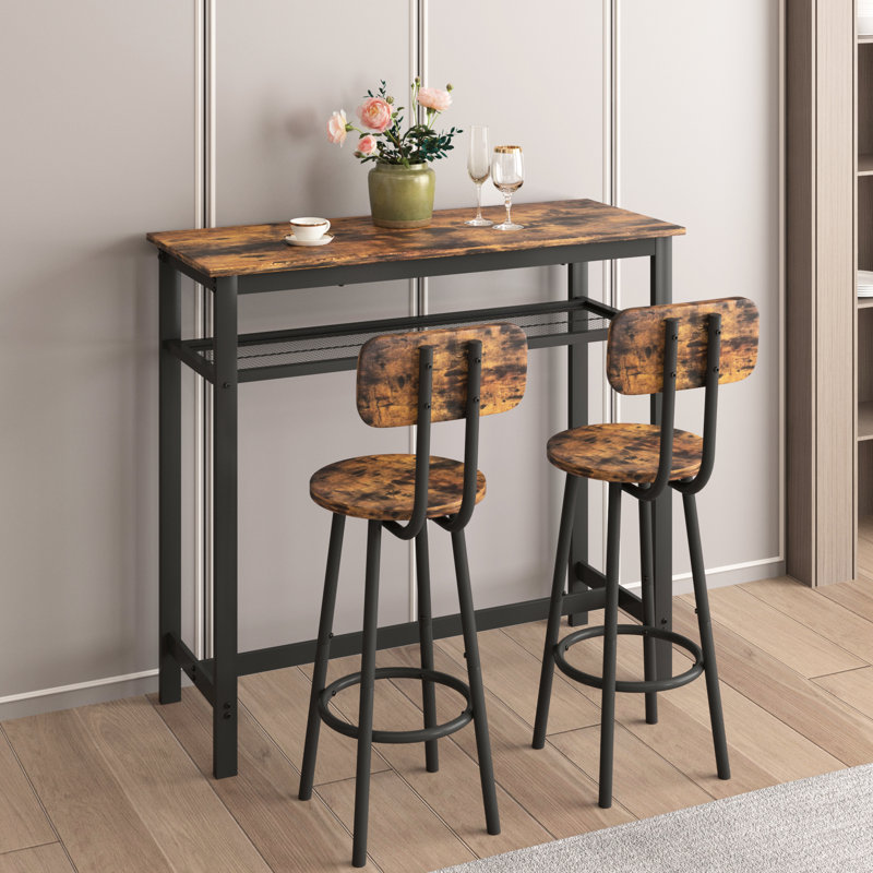 Ensemble de table haute de bar brun rustique et 2 tabourets. En fer. Structure robuste et stable. Pieds antidérapants. Tabourets pliables pour gagner de la place. Métal effet bois tendance.