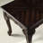 Warm Colored Dark Cherry Wood Coffee Table With Ornate Carvings Decor